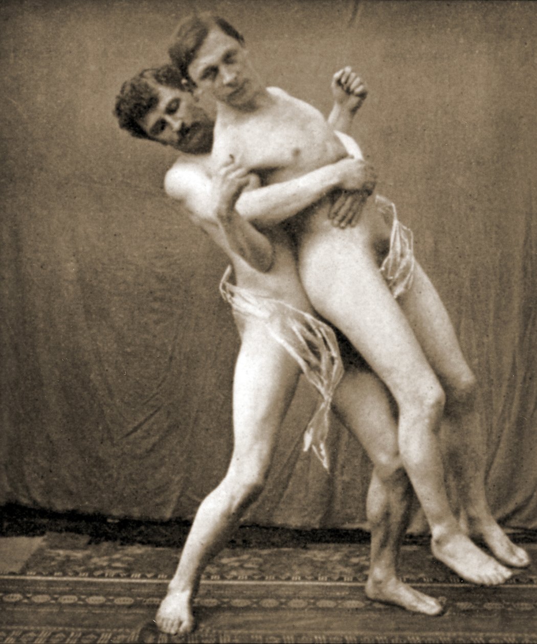 Zápasníci demonstrují držení v pase, cca 1910 (sépiová fotografie) od Unknown