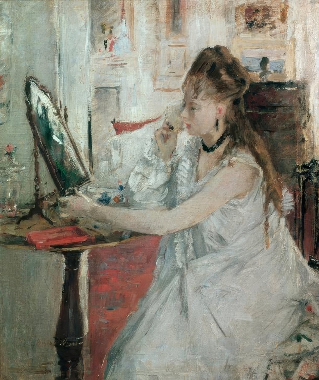 Jeune femme se poudrant (mladá žena, která se pudruje) od Berthe Morisot