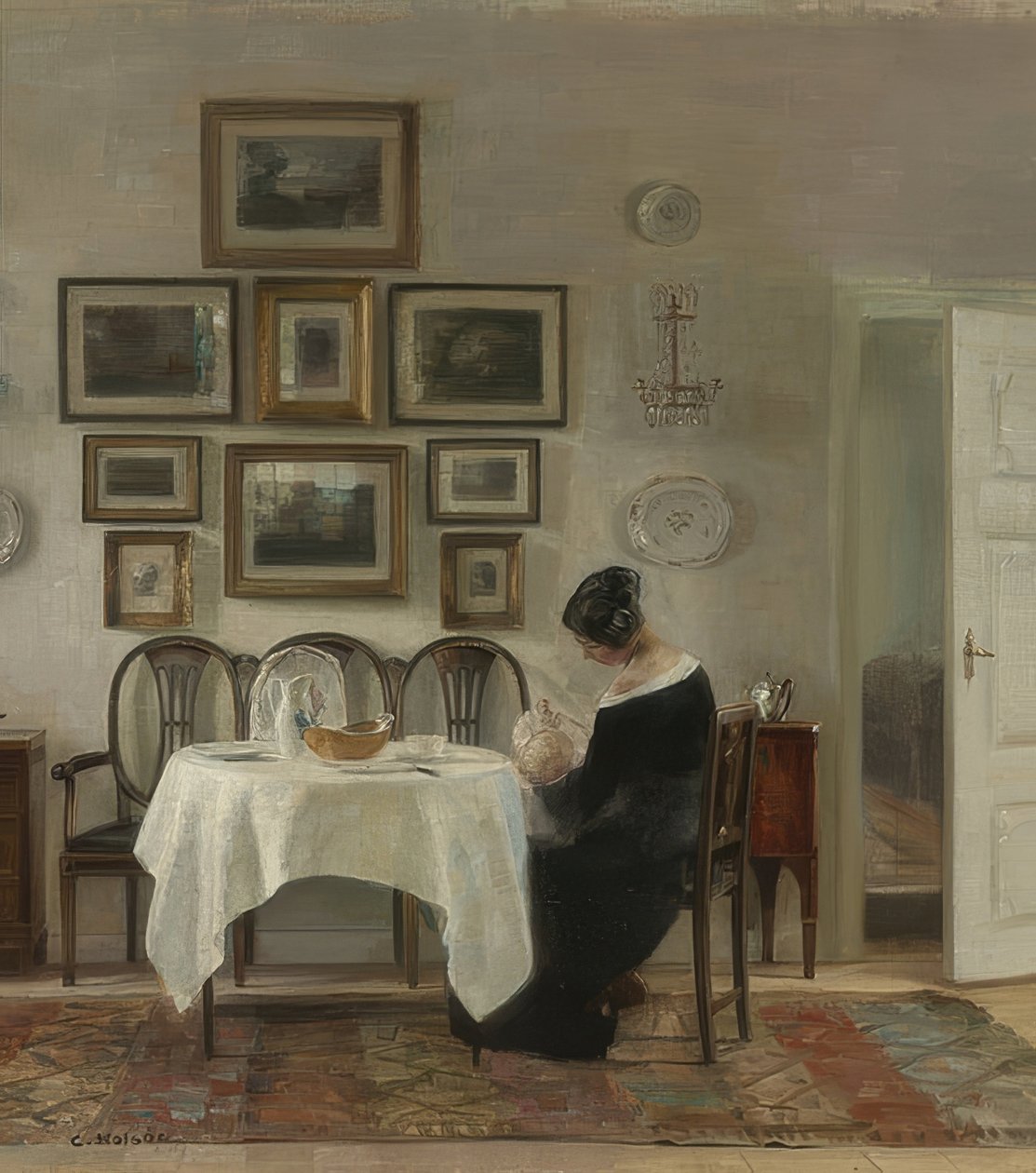 Matka a dítě u stolu od Carl Holsoe