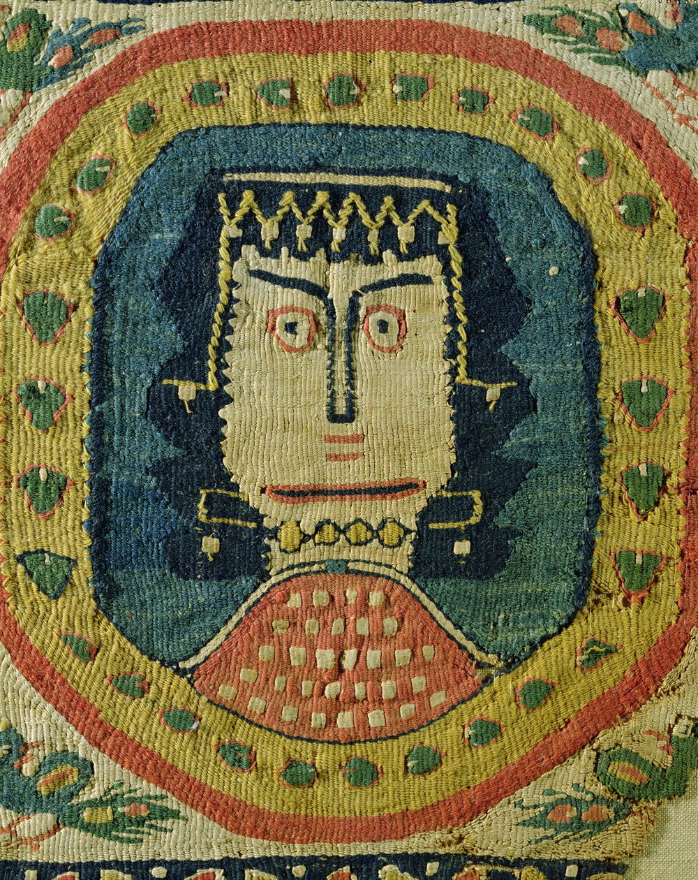 Ženské poprsí v medailonu (len a vlna) od Coptic