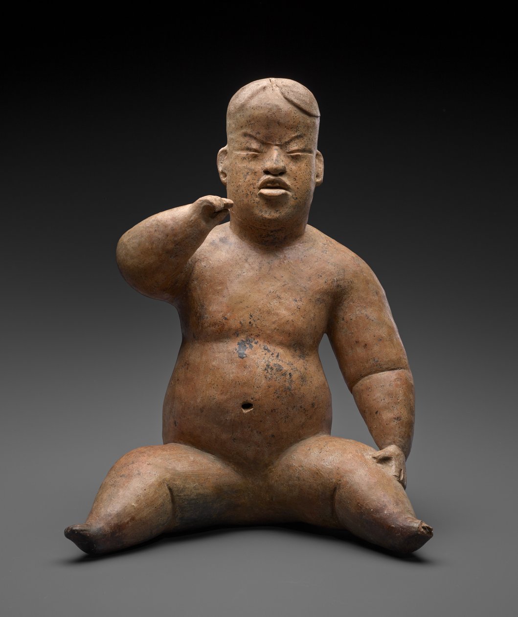 Sedící postava od Culture Olmec