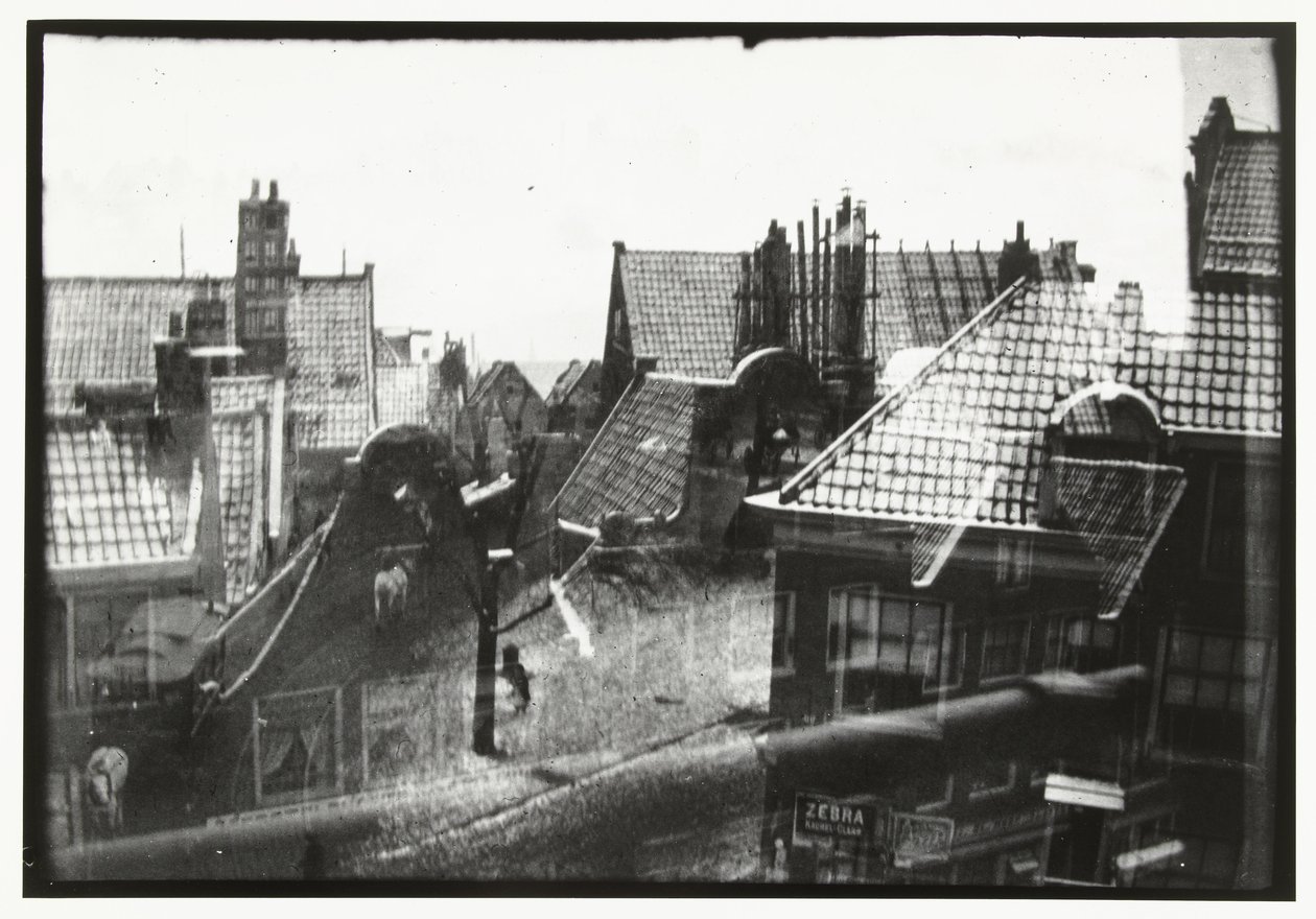 Pohled přes střechy v Amsterdamu od George Hendrik Breitner