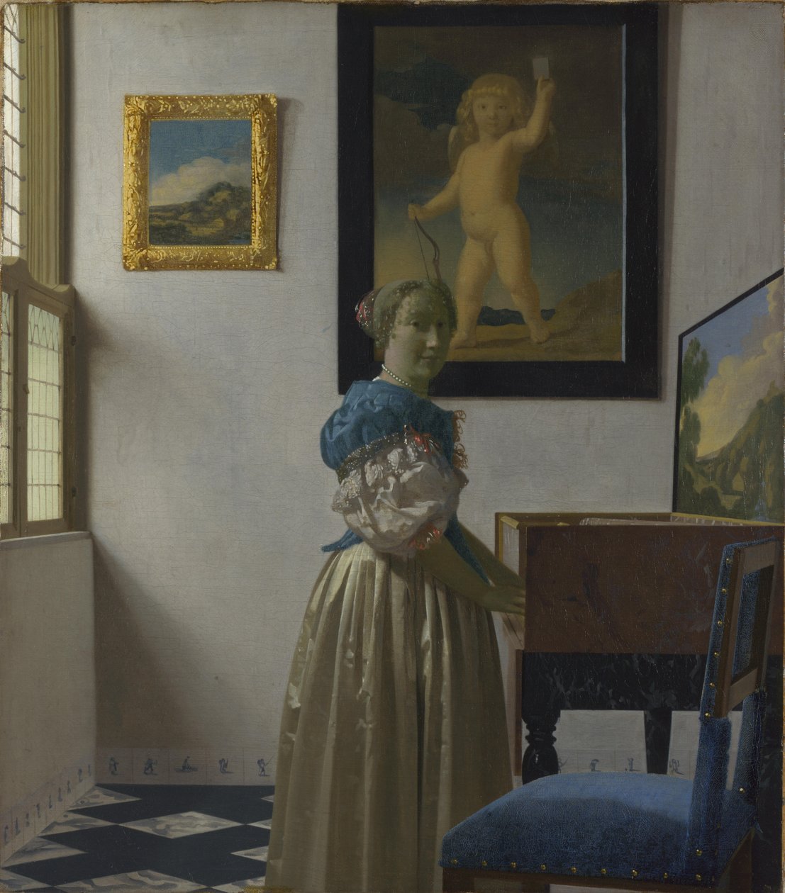 Mladá žena stojící u panny od Johannes Vermeer