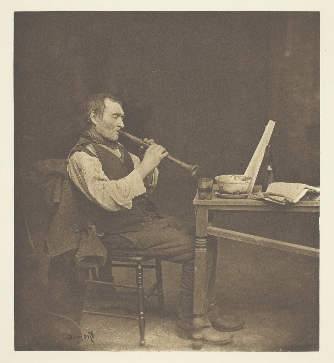 Hráč na klarinet, c. 1897. od John E. Dumont