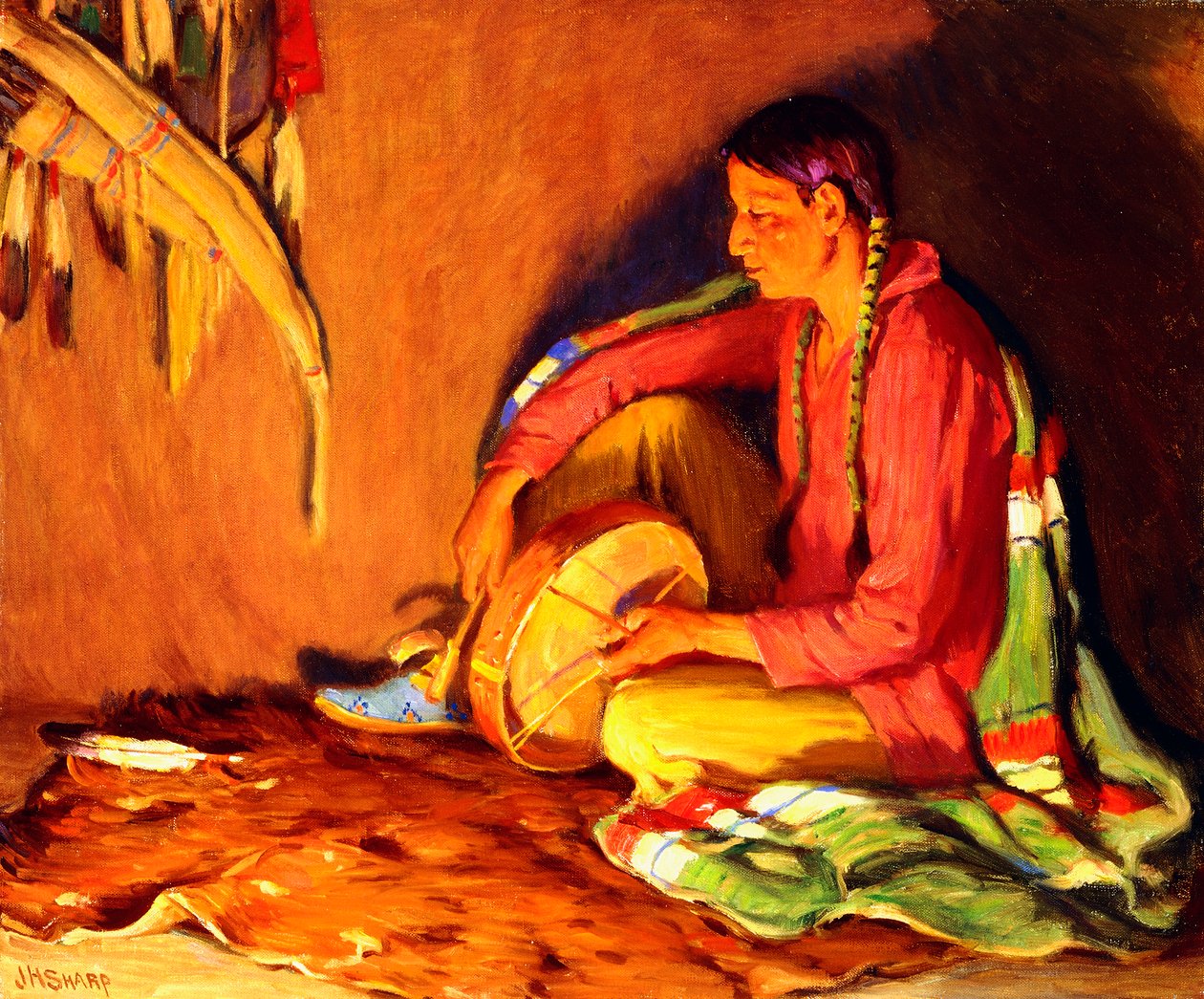 Bubeník ve světle ohně od Joseph Henry Sharp