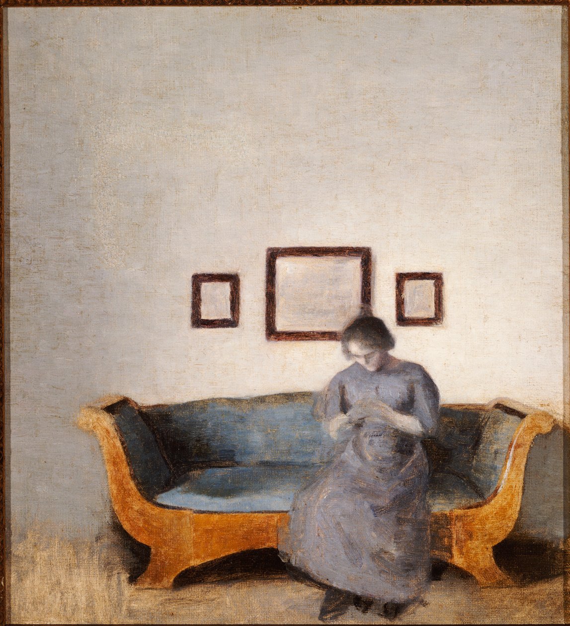 Ida Hammershoi sedí na pohovce od Vilhelm Hammershoi