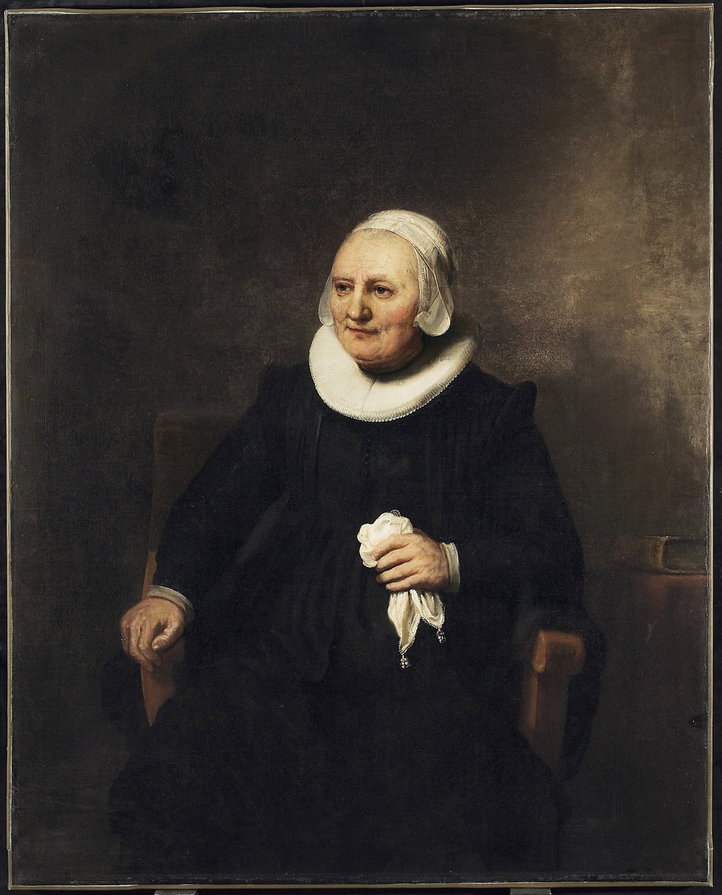 Portrét sedící ženy s kapesníkem, 1644 od studio of Rembrandt Harmensz. van Rijn