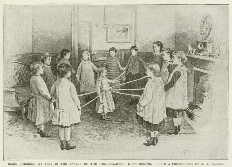 Slepé děti si hrají v salonu mateřské školy poblíž Bostonu od American School